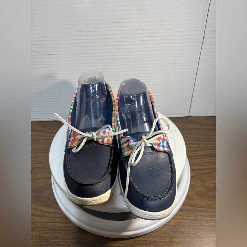 Falls Creek women’s 11 boat or deck shoes. Leather laces navy w/red & white trim